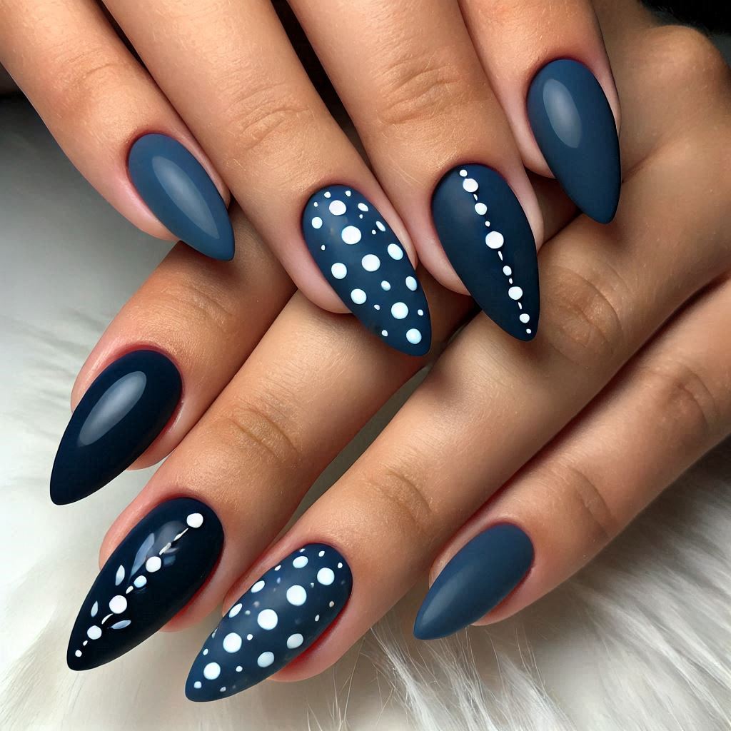 Almond-shaped navy blue nails with white dots