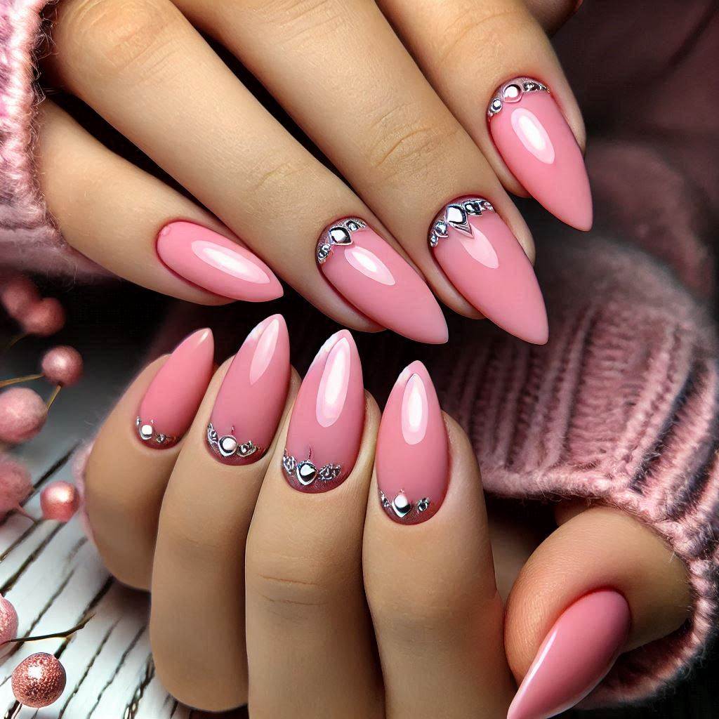 Trendy almond pink nails with silver accents