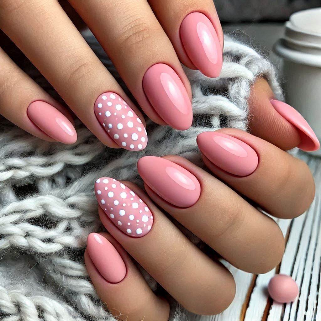 Almond pink nails with white dots