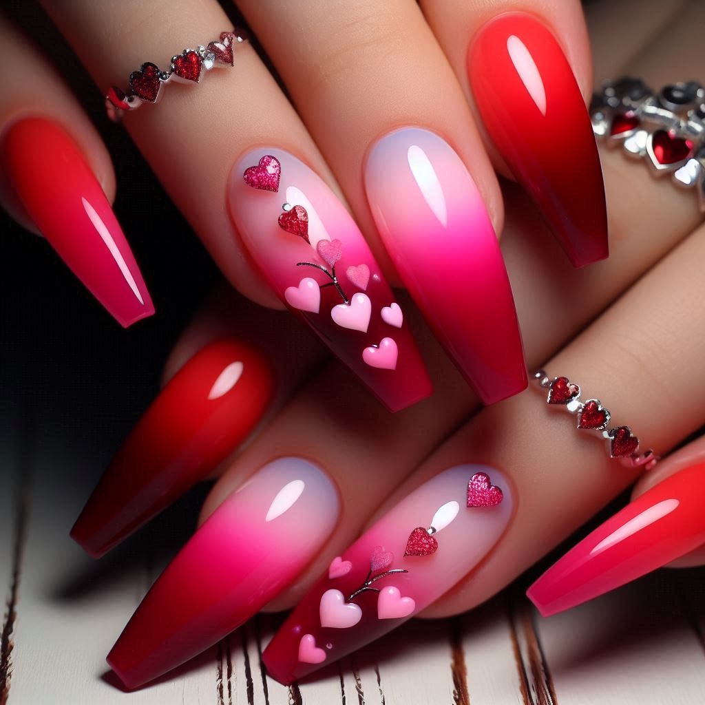 Red and pink ombre nails with heart shapes