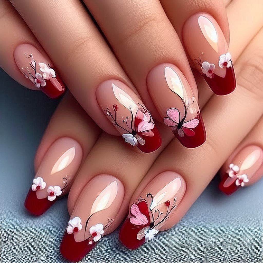 Red French Tip Nails with Butterfly Accents for a Dreamy Look